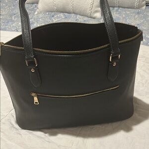 Coach Black Tote Bag with Structured Shape and Elegant Design